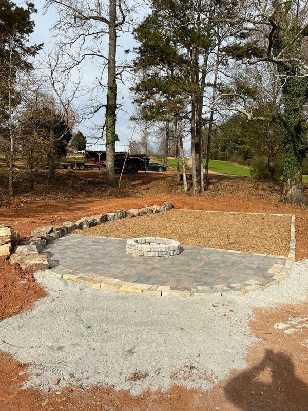 Paver patio and outdoor living area built by Heritage Landscape